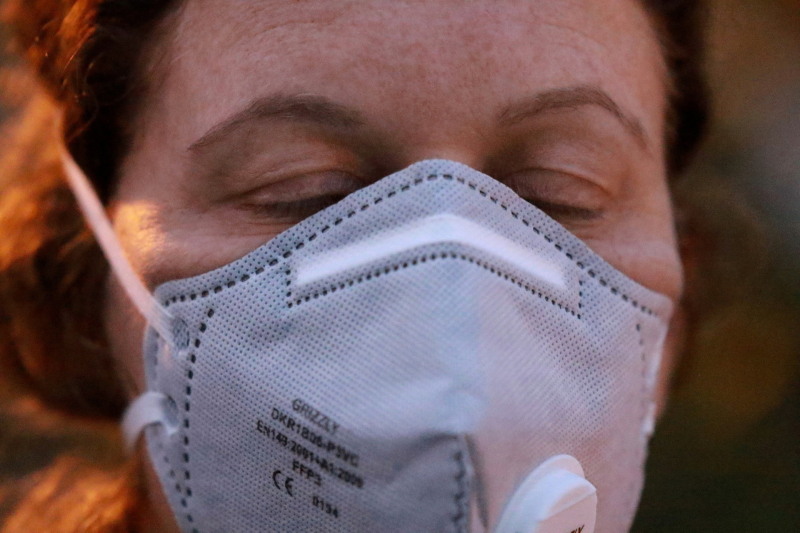 close-up of a woman wearing Covid-19 protection mask